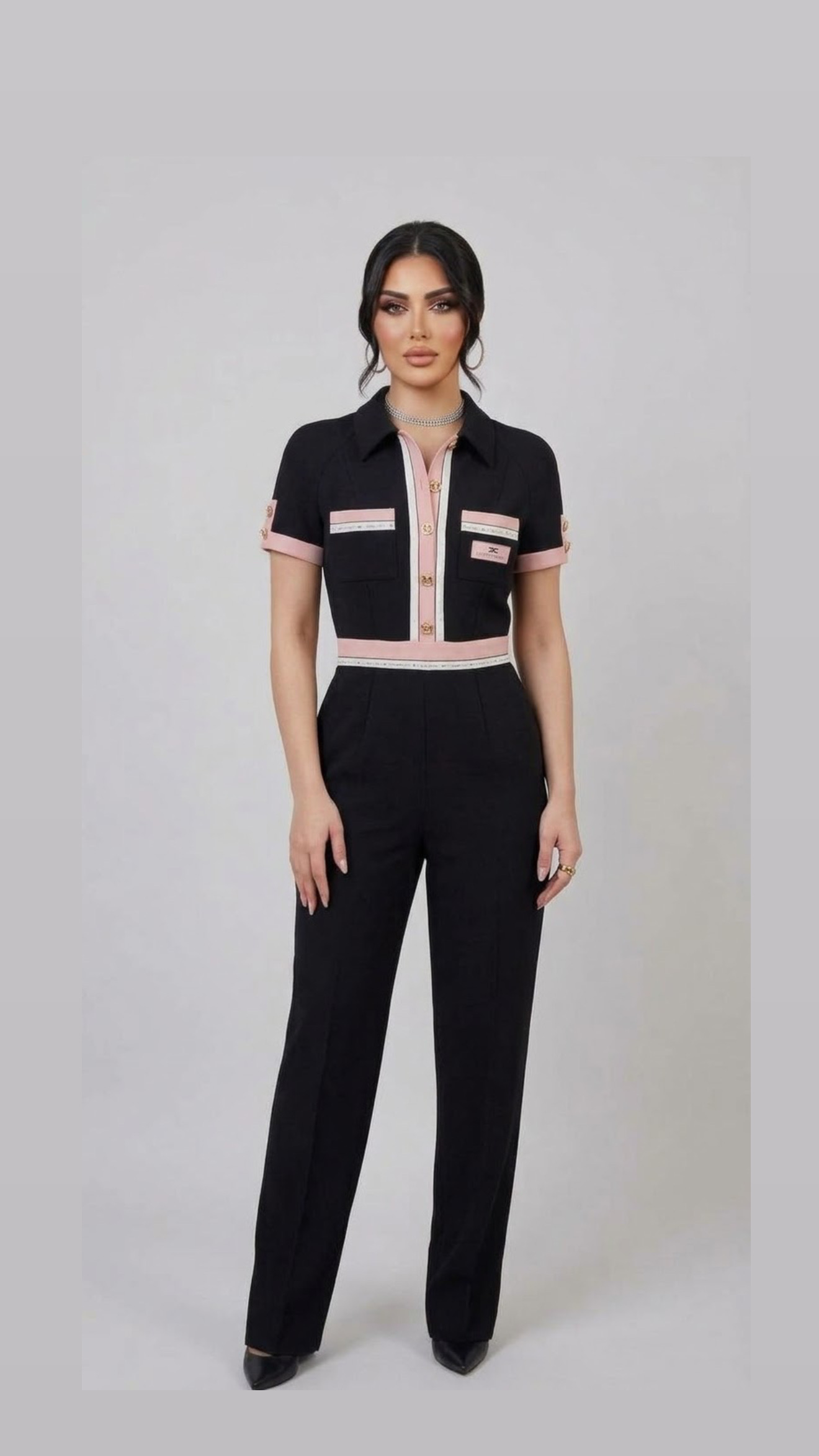 Black jumpsuit with pink details